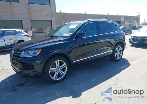 2014 Volkswagen Touareg 3.6L Executive/3.6L Lux/3.6L R-Line/3.6L Sport from USA, damaged, VIN WVGDF9BP5ED002594